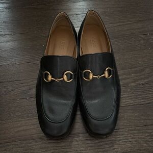 Black Gucci loafers
